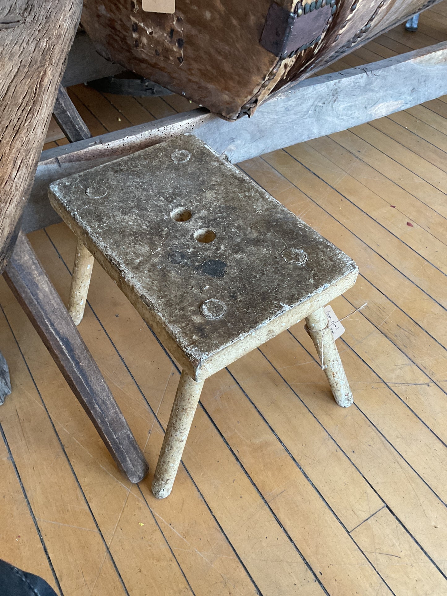 Cream colored milking stool